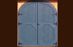 Arched wood doors